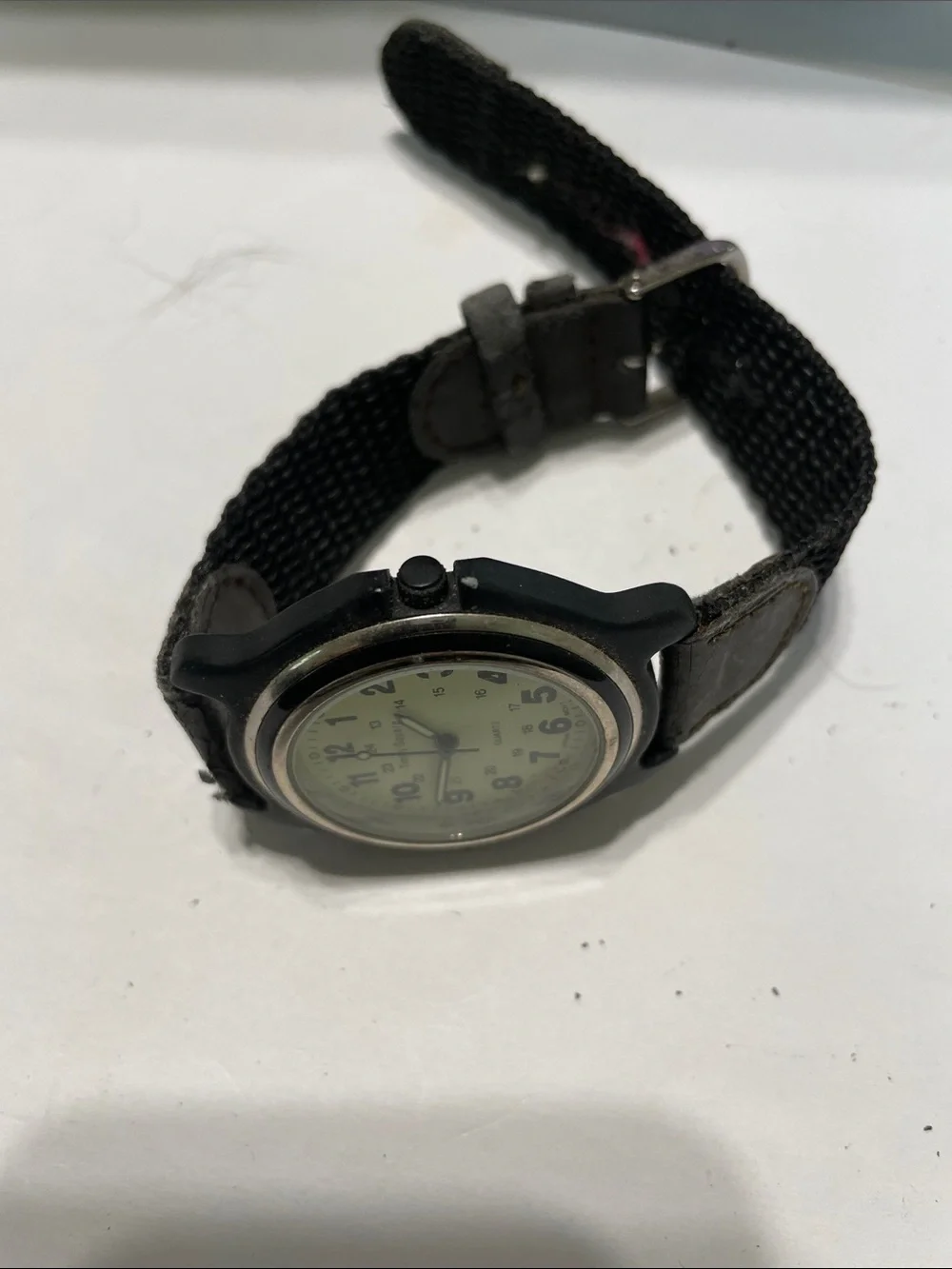 Times Square Men’s Black Watch with Luminous Dial.  Needs Battery.